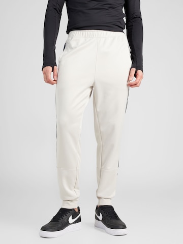 Regular Pantalon fonctionnel 'AIR' Nike Sportswear en beige : devant