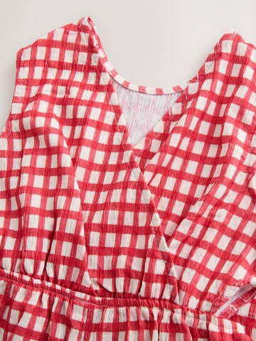 Next Overall värissä punainen