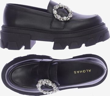 Alohas Flats & Loafers in 38 in Black: front