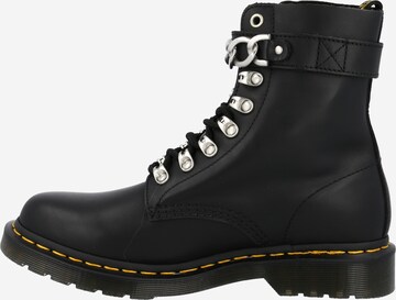 Dr. Martens Paeltega poolsaabas, värv must