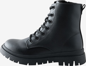 Next - Botas en negro: frente