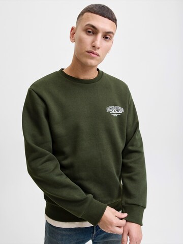 Bluză de molton 'JJMAKOTO' de la JACK & JONES pe verde