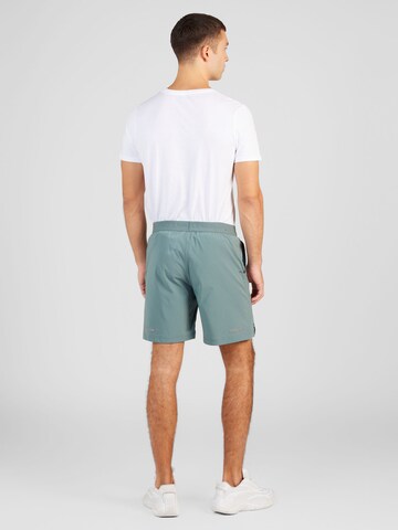Champion Authentic Athletic Apparel Regularen Športne hlače | zelena barva