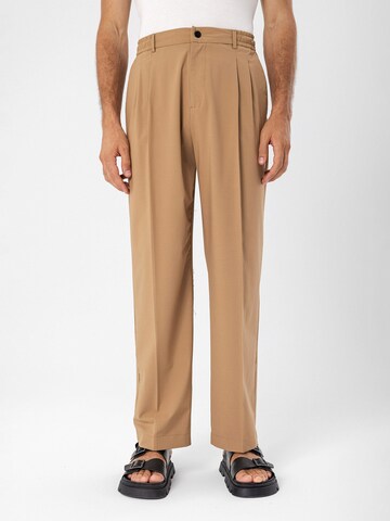 Antioch Regular Pleat-front trousers in Beige: front
