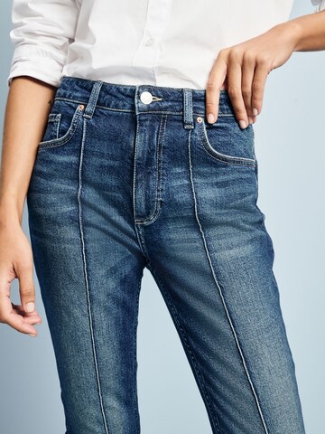 Skinny Jeans di Next in blu