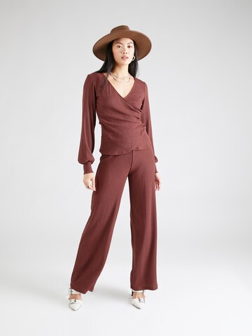 ABOUT YOU Loose fit Trousers 'Emina' in Brown