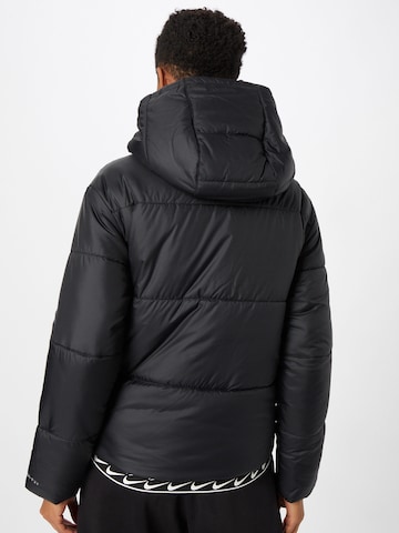 Nike Sportswear - Chaqueta de entretiempo en negro