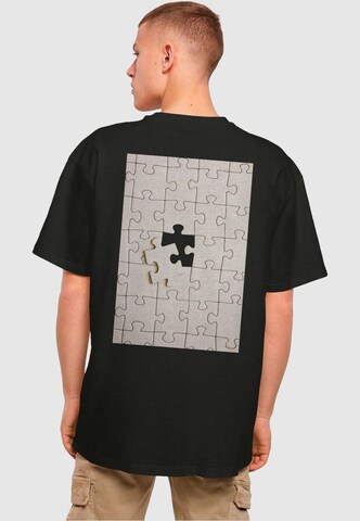 Merchcode T-Shirt 'Missing Peace' in Schwarz: Vorderseite