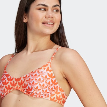ADIDAS ORIGINALS Balkonetka Góra bikini 'Monogram' w kolorze pomarańczowy
