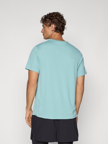 NIKE Sportshirt 'MILER' in Grün