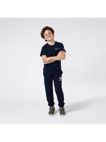 Effilé Pantalon de sport Champion Authentic Athletic Apparel en bleu