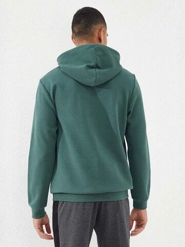 Sweat-shirt Tommy Life en vert