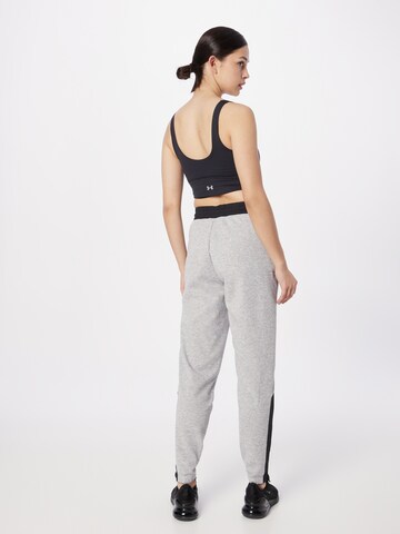 Effilé Pantalon de sport 'Moments' new balance en gris