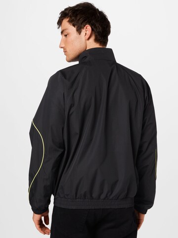 ADIDAS ORIGINALS Trainingsjacke 'R.Y.V.' in Schwarz