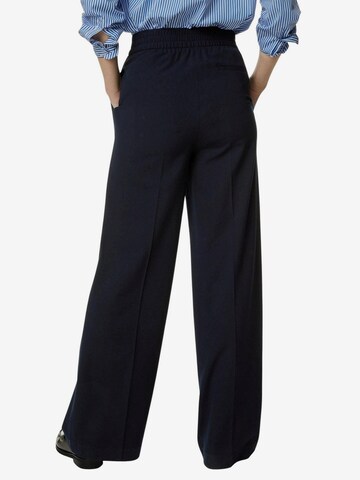 Wide leg Pantaloni con piega frontale di Marks & Spencer in nero
