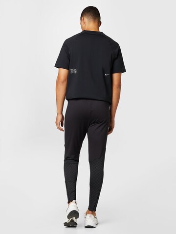 NIKE Regular Sports trousers 'Strike' in Black