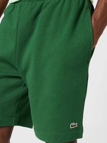 LACOSTE Regular Trousers in Green