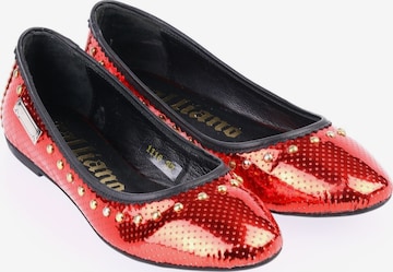 Galliano Flats & Loafers in 38 in Red: front