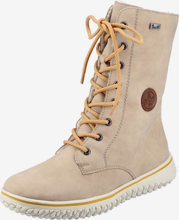 Rieker - Botas con cordones en beige: frente