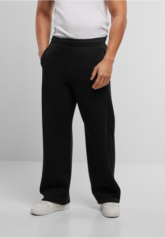 Karl Kani Regular Pants in Black: front