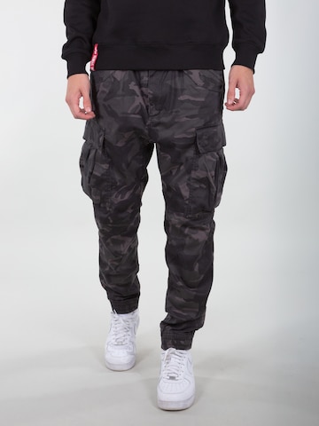 ALPHA INDUSTRIES Tapered Cargo trousers in Black