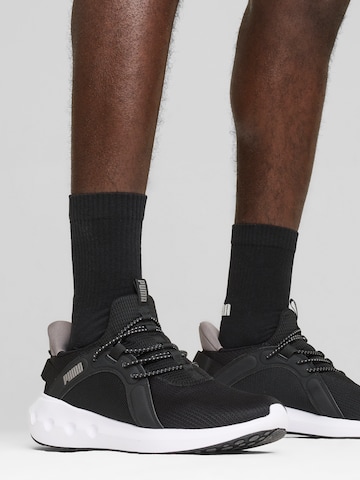 PUMA Loopschoen in Zwart