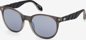 Lunettes de soleil ADIDAS ORIGINALS en gris : devant