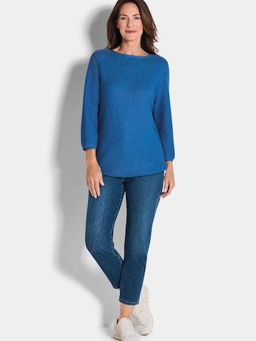 Goldner Pullover in Blau