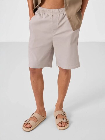 Tommy Life Loosefit Broek in Beige: voorkant
