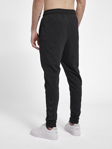 Regular Pantalon de sport Hummel en noir