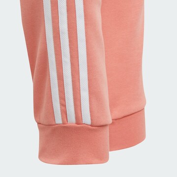 ADIDAS ORIGINALS Tapered Trousers 'Trefoil' in Orange