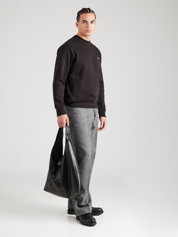 BOSS Sweatshirt 'We_Mixdenim' in Schwarz