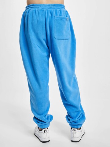 Tommy Jeans Zúžený Kalhoty – modrá