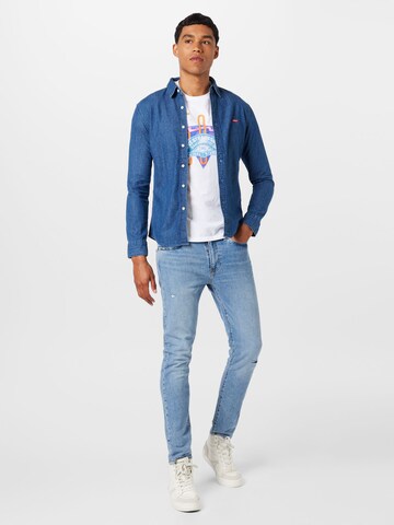 balta LEVI'S ® Standartinis Marškinėliai 'Graphic Crewneck Tee'