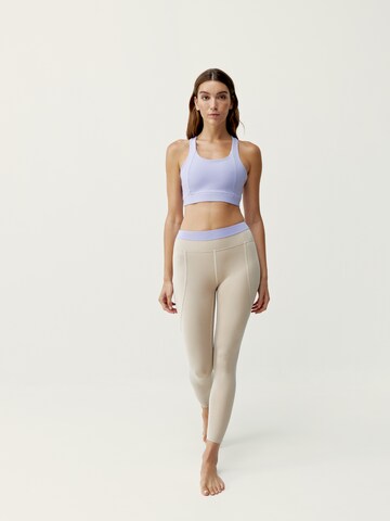 Skinny Pantalon de sport 'Navani' Born Living Yoga en beige