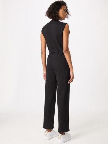 PUMA - Jumpsuit 'Her' en negro