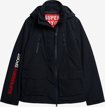 Veste fonctionnelle Superdry en bleu : devant