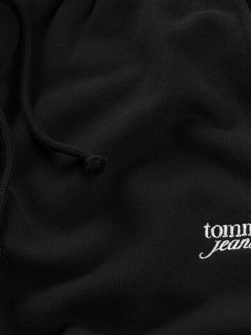 Tommy Jeans Tapered Housut värissä musta