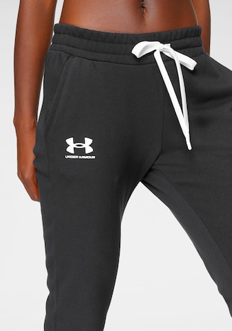 UNDER ARMOUR Tapered Παντελόνι φόρμας 'Rival' σε μαύρο