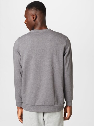 NIKE - Sweatshirt de desporto em cinzento