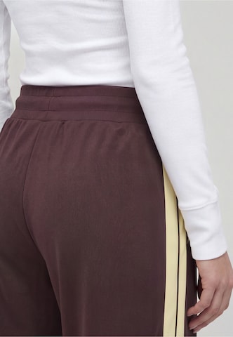 Sergio Tacchini Regular Trousers in Purple: back
