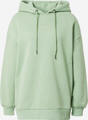 Karl Kani Sweatshirt 'KW224-055-2 KK Small Signature' i grön: framsida