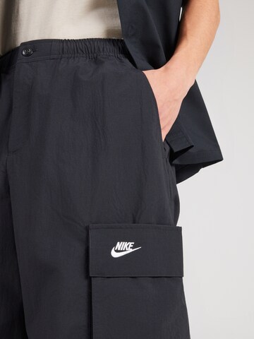 Nike Sportswear Loosefit Cargobyxa 'CLUB' i svart