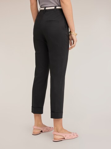 MOTIVI Slim fit Trousers in Black
