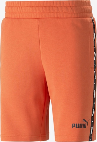 PUMA Workout Pants in Orange: front