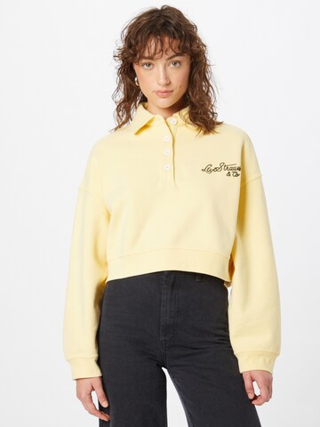 LEVI'S ® Sweatshirt 'Graphic Cropped Stevie' in Yellow: front