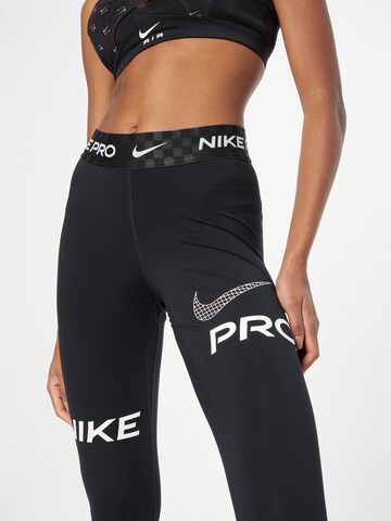 NIKE Skinny Sportbroek in Zwart