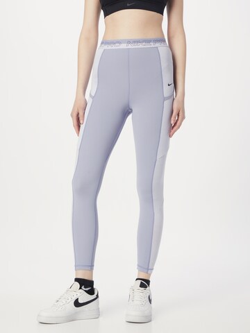 NIKE Skinny Sportbroek in Lila: voorkant