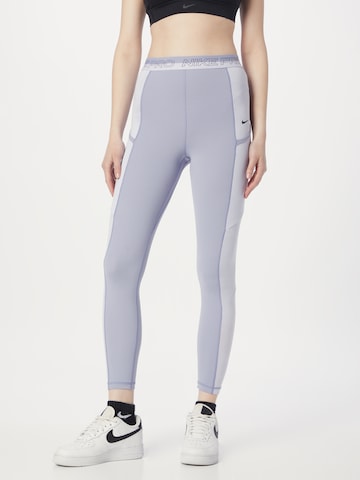 NIKE - Skinny Pantalón deportivo en lila: frente