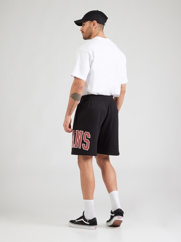 Loosefit Pantalon 'Inter' VANS en noir : derrière